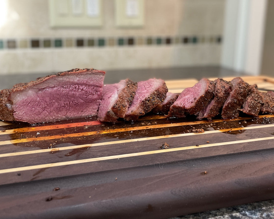 Sliced nebraska raised steak grass fed grain finished